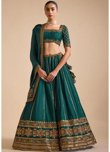 Charming Green Mehendi event Lehenga choli with elegant zari and sequin work